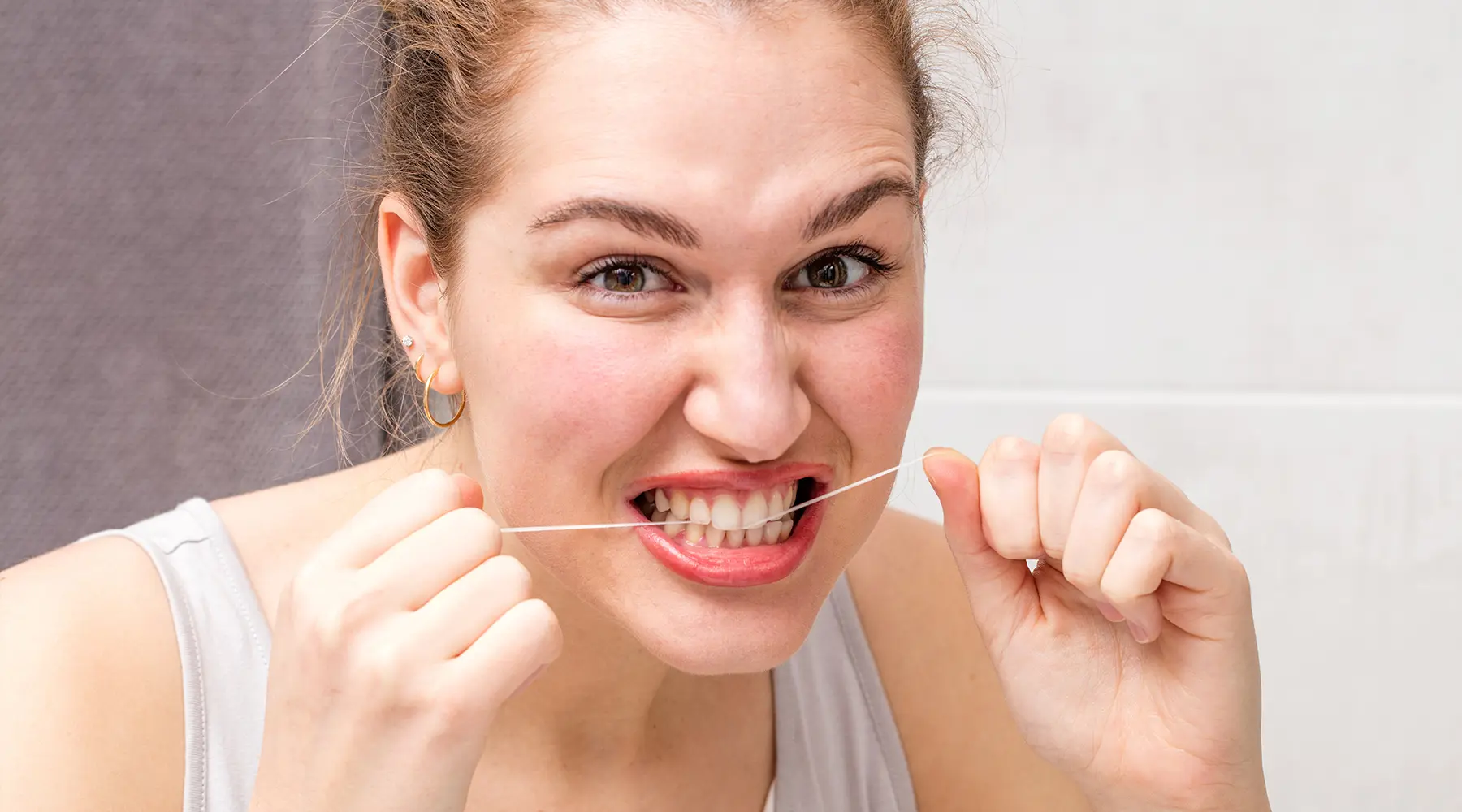 Why It Smells Bad When You Floss (and What to Do About It)